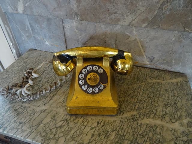 Image used under a Collective Commons License from: https://commons.wikimedia.org/wiki/File:Museo_de_la_Revolucion-Batista_golden_phone.jpg Image used under a Collective Commons License from: https://commons.wikimedia.org/wiki/File:Museo_de_la_Revolucion-Batista_golden_phone.jpg